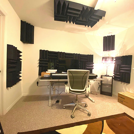 home recording studio setup with acoustic treatment