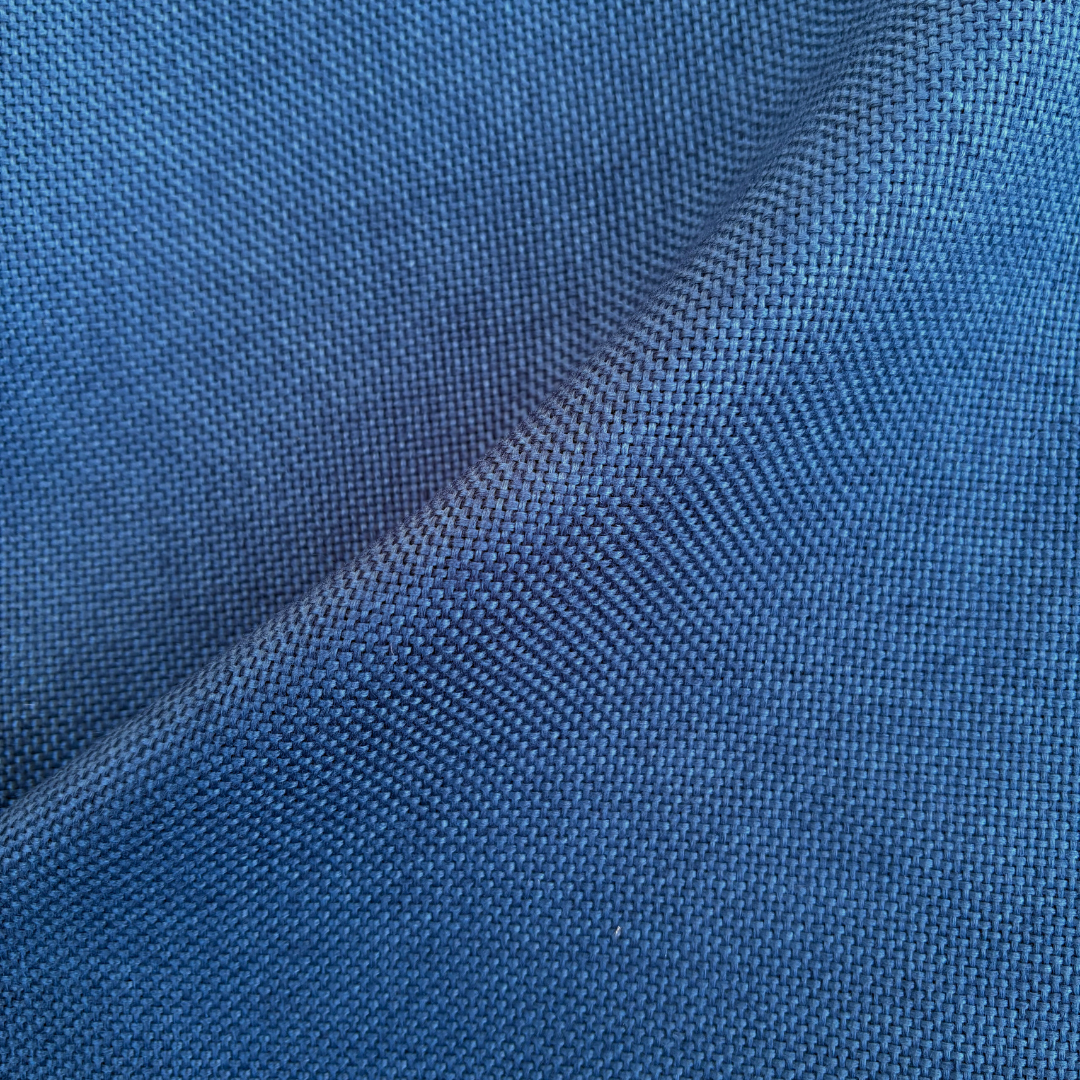 SoundAssured TruWeave midnight teal acoustic fabric designed for acoustic wall panels, speaker grills, and amp covers – high-quality polyester with superior sound transparency.